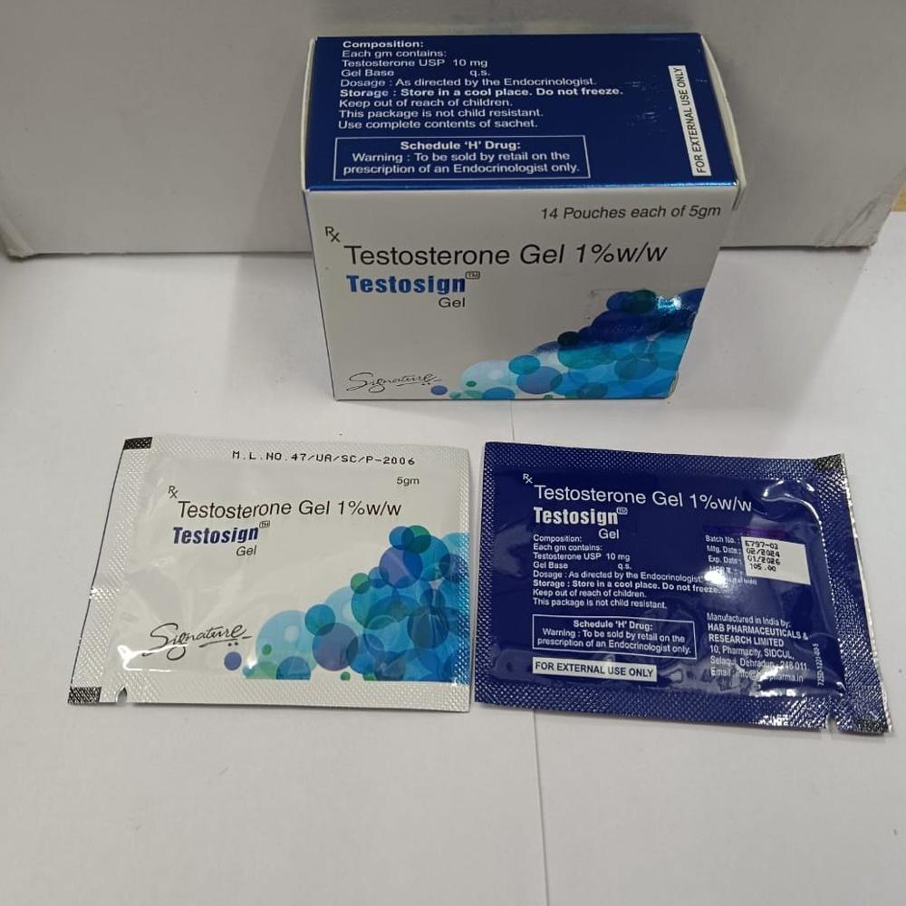 Testosterone Gel 1% w/w Testosign brand, showing the main product box, one silver single-dose pouch, and one blue single-dose pouch on a white surface.